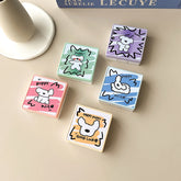 Estuche para lentes de contacto de colores con diseño de cachorro de dibujos animados